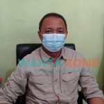 BERMASKER: Ketua KPU Sumenep, A. Warits, saat ditemui media. (Foto: Dok. Wartazone)