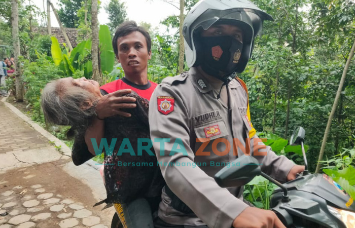 Foto: Aksi Heroik Bripka Yudhi saat menolong nenek malang yang terperosok di bukit perkebunan kopi di Dusun Ajung Kemiri, Desa Ajung, Kecamatan Kalisat, Jember.