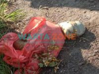 Foto: Kondisi bayi saat ditemukan warga terbungkus kantong plastik merah.
