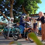 Foto: SMSI Kabupaten Sumenep menggandeng produsen Sari Roti distributor Jawa Timur untuk berbagi ratusan paket takjil yang dipusatkan di sepanjang jalan barito, Desa Pandian, Kecamatan Kota Sumenep.