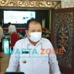 Caption : Bupati Jember, Hendy Siswanto, saat dikonfirmasi sejumlah wartawan usai rapat koordinasi (Rakor) percepatan Vaksinasi Covid-19 di Pendapa Wahyawibawagraha.