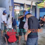 Caption: Pemotongan hewan kurban di Kantor DPC Partai Demokrat Jember di Jalan Sriwijaya, Kecamatan Sumbersari, Selasa (20/7/2021).