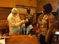 Caption : Tim Covid Hunter On The Spot, saat menemui para pelanggar aturan PPKM Darurat. dengan dilanjutkan Swab Tes ditempat, Rabu (7/7/2021) malam.