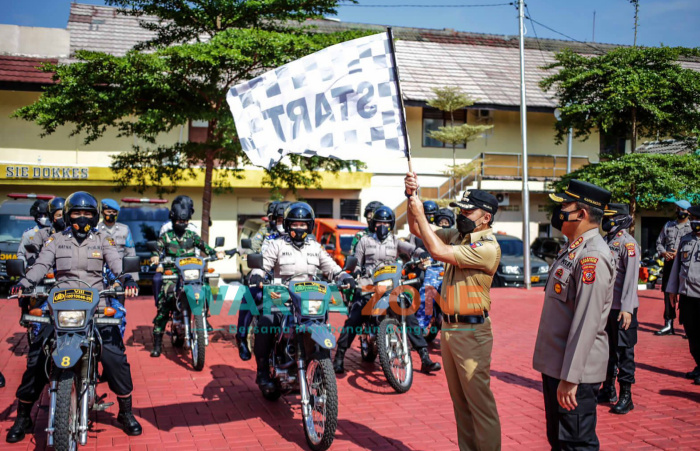 Foto: Kaporesta Bogor Kota, Kombes Pol Susatyo Purnomo Condro (kanan), Wali Kota Bima Arya saat launching Srikandi Tim Penjemput Vaksinasi.