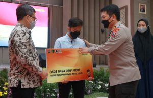 Launching Yankes Luar biasa, Polda Jatim Beri Jaminan Kesehatan Anak Yatim Piatu Korban Covid-19
