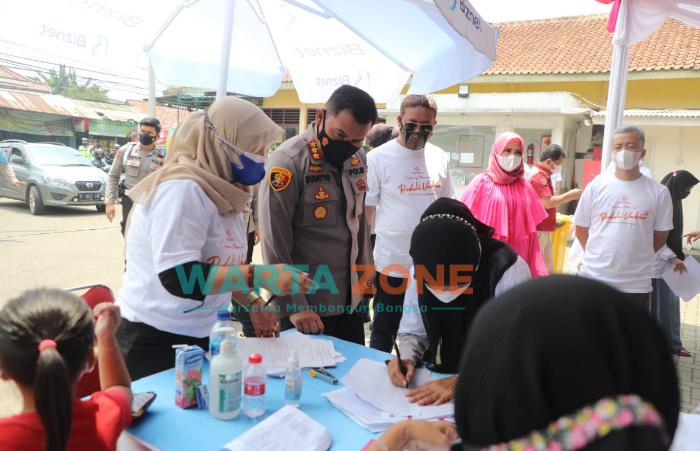 Foto: Kapolresta Bogor Kota, Kombes Pol Susatyo Purnomo Condro (tengah), saat pembukaan vaksinasi presisi.