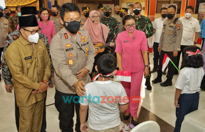 Foto: Polda Jawa Timur, saat berikan dukungan psikososial bagi anak-anak yatim piatu terdampak covid-19 dan penyandang disabilitas, di Universitas Brawijaya, Malang.