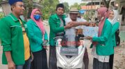 Foto: PAC GP Ansor bersama PAC Fatayat NU Pulau Giliraja, Kecamatan Giligenting, saat menggelar penggalangan dana untuk membantu korban terdampak erupsi Gunung Semeru.