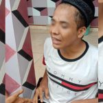 Foto: AS (30), residivis curanmor menjadi bulan-bulanan warga di pinggir jalan Desa Lebeng Barat, Pasongsongan, Minggu (16/1/2022) sore.