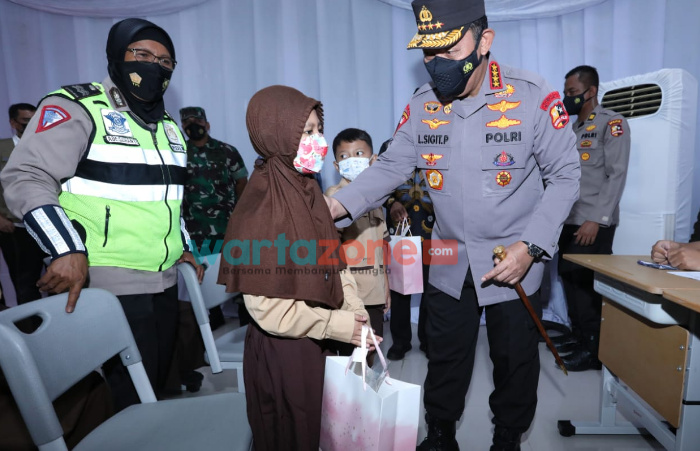 Foto: Kapolri Jenderal Listyo Sigit Prabowo menghadiri peluncuran vaksinasi merdeka anak di SDN 01 Mangga Dua Selatan, Sawah Besar, Jakarta Pusat.