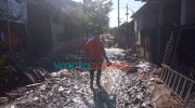 Foto: Tampak bangunan dan jalanan yang rusak parah akibat banjir bandang, Minggu (9/1/2022) kemarin, yang melanda di 3 Kecamatan di Jember.