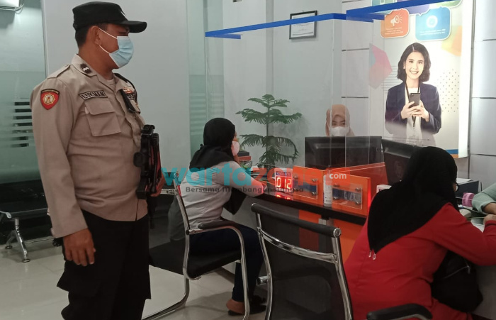 Personel Polsek Kota Kisaran Sambangi Bank BRI, Sampaikan Pesan Kamtibmas