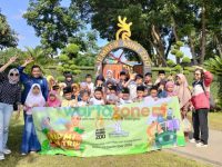 Libur Tahun Baru, Puluhan Anak Yatim Piatu Wisata ke Kebun Binatang Mini di Jember