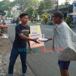 Jumat Berkah, PWI Jember Bagikan Ratusan Nasi Bungkus di Daerah Kampus