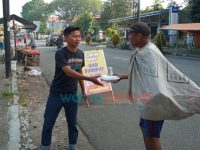 Jumat Berkah, PWI Jember Bagikan Ratusan Nasi Bungkus di Daerah Kampus