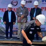 Caption: Peletakan batu pertama Pembangunan Rumah Sakit Harapan Sehat, di Kecamatan Mayang, Jember.