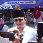 Foto: Ketua Asosiasi Pemerintah Desa Seluruh Indonesia (APDESI) Jember yang juga Kepala Desa Sidomulyo, Kamiludin, saat diwawancarai media.